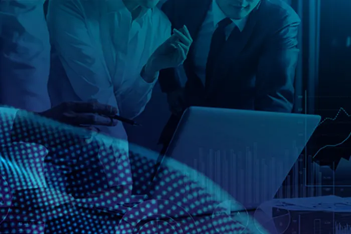 Future-X Akademie - Microsoft Lizenzberatung Future-X Akademie - Microsoft Lizenzberatung - Welle aus hellblauen Punkten mit Personen vor einem Notebook im Hintergund