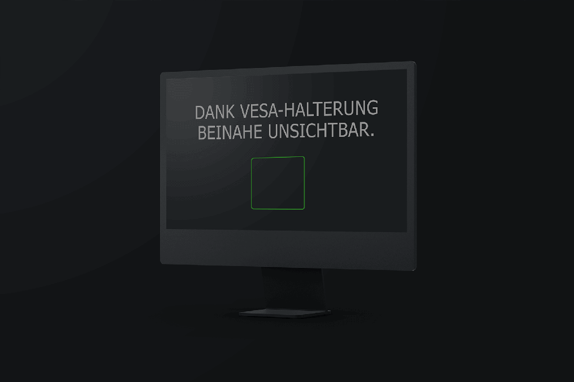 Future-X TAROX Mini-PC ECO 44 G13 - Dank Vesa-Halterung beinahe unsichtbar - Mini-PC und Monitor auf schwarzem Hintergrund
