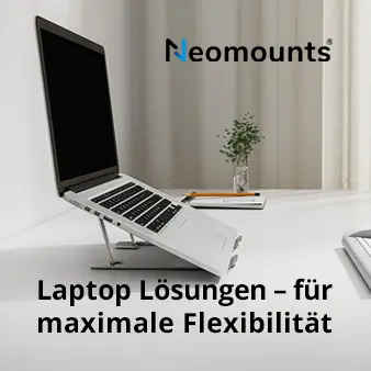 Neomounts Laptop Lösungen – Effizient und unabhängig, für maximale Flexibilität. Foto eines Laptopständers, der ein Notebook hält und auf einem hellgrauen Schreibtisch steht.